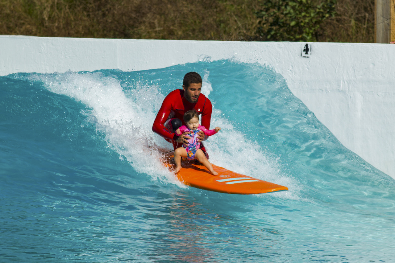 WCT surfer Felipe Toldeo with his daughter at the Wavegarden Cove