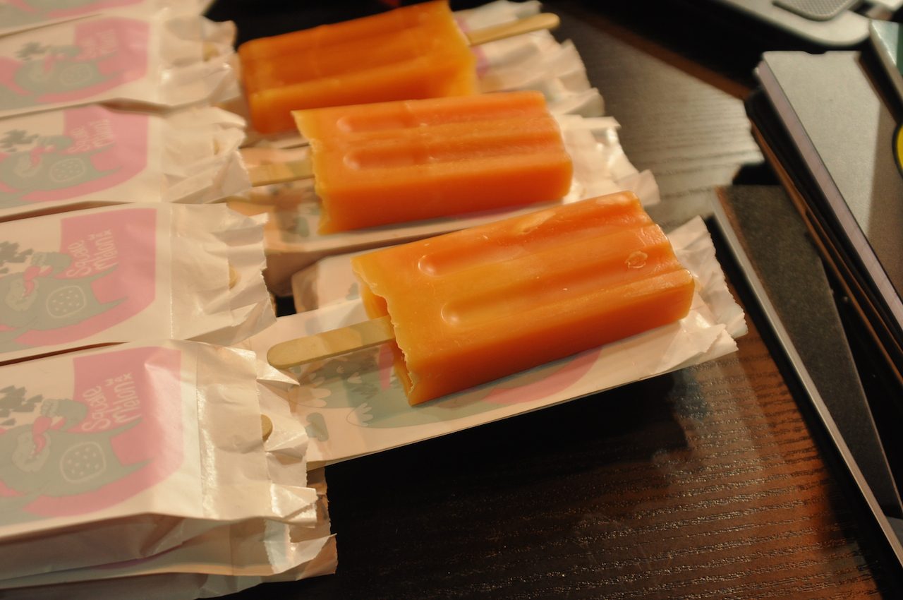 Square Melon launching snowboard wax. Ice lolly shape is functional, as stops user from burning fingers on iron while waxing. Genius!