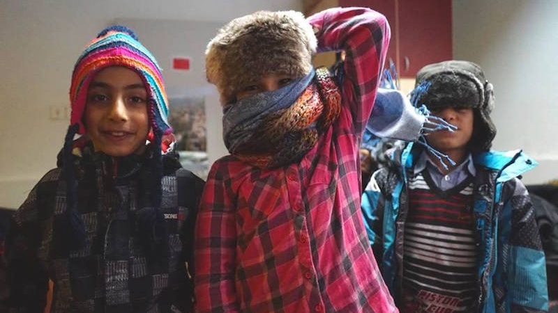 Riders for Refugees_refugee children in their warm clothing_by Alexis de Tarade