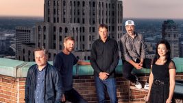 From left: D/CAL co-founders Ryan Maconochie, Jared Prindle, Tony Hawk and Adam Wilson with Katherine Huber, director of client services, atop the Guardian Building in downtown Detroit, where they have an office for their new agency.