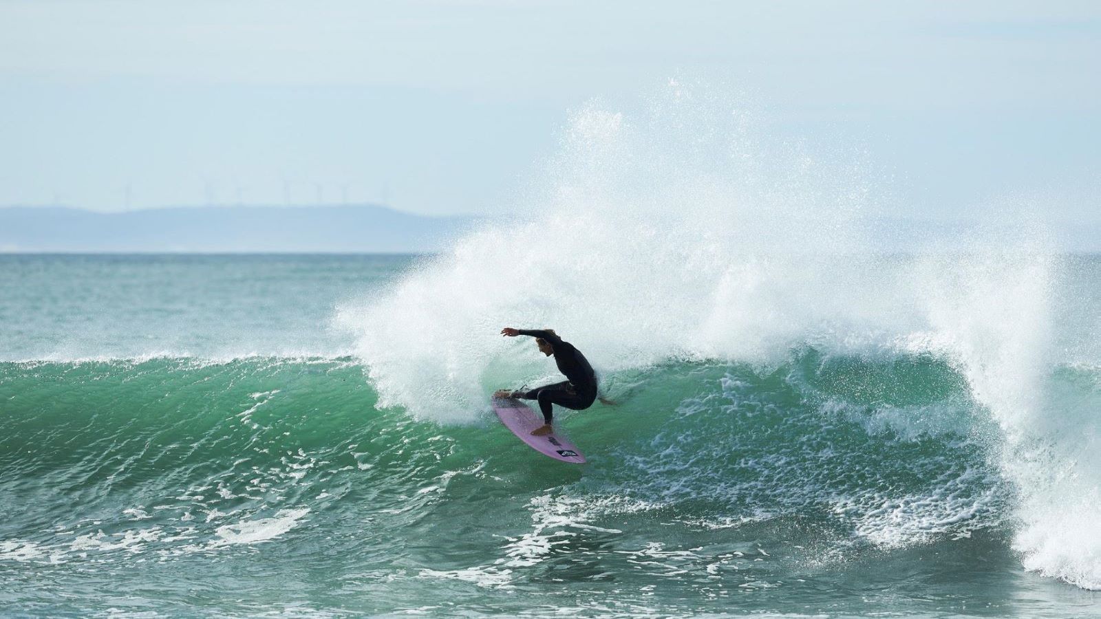 Stephanie Gilmore hitting the waves