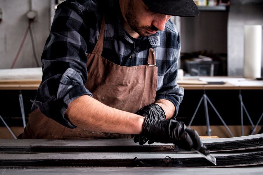 Selim Abdi shaping a ski prototype - Credit_ MVD Media